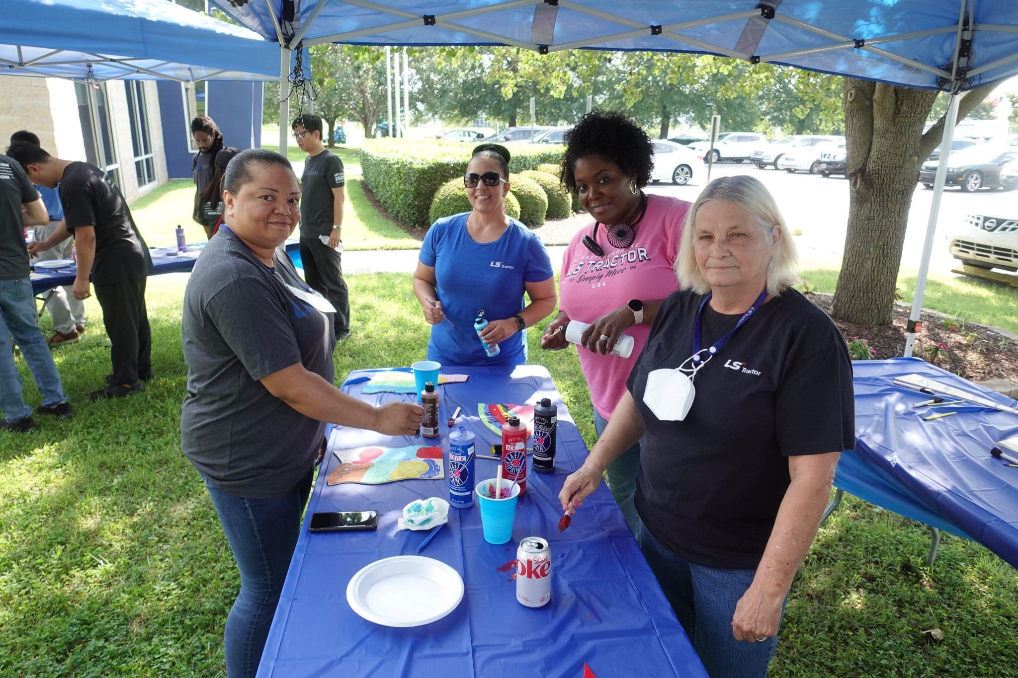 people doing crafts outside